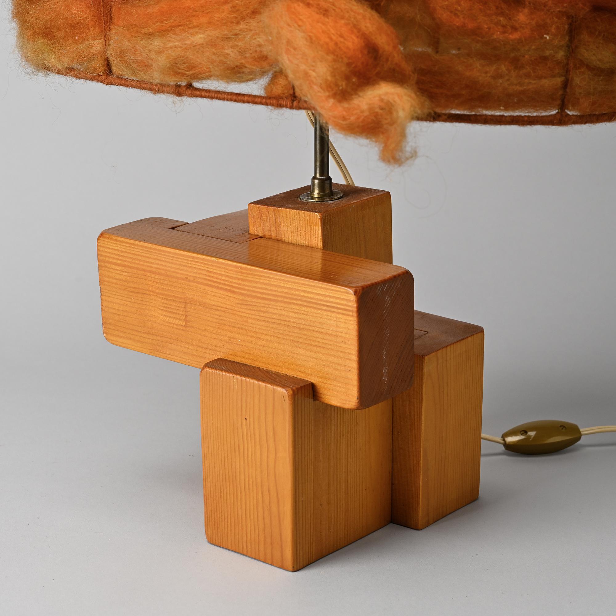 Sculptural table lamp in solid pine, France, circa 1970.