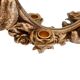 Oval wall mirror in Art Nouveau style with a decoration of birds and roses.