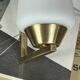 Vintage brass wall light with a white glass spindle shade from the 1950s-1960s.