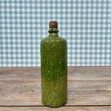 Old green sandstone bottle