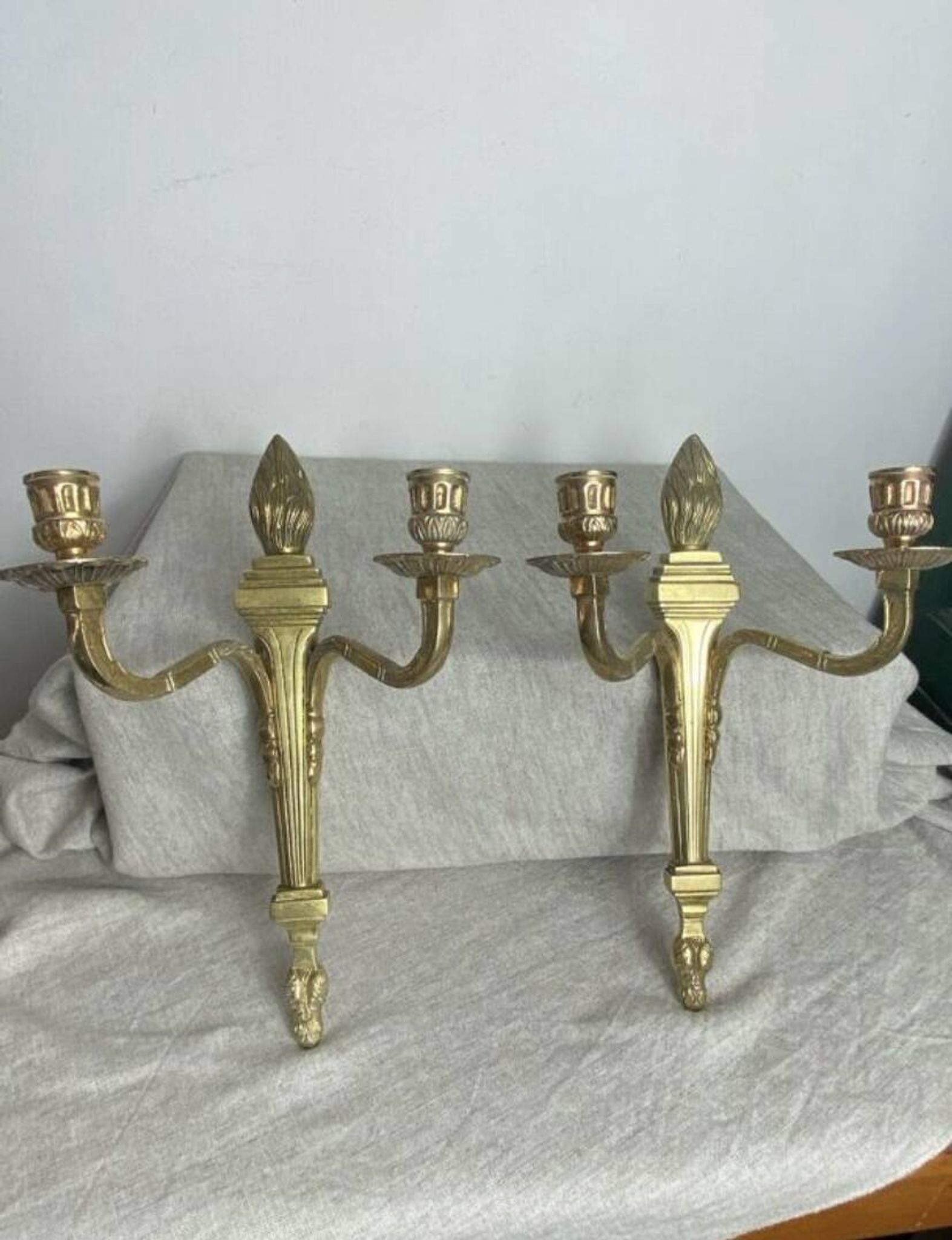 Pair of wall candle holders in bronze
