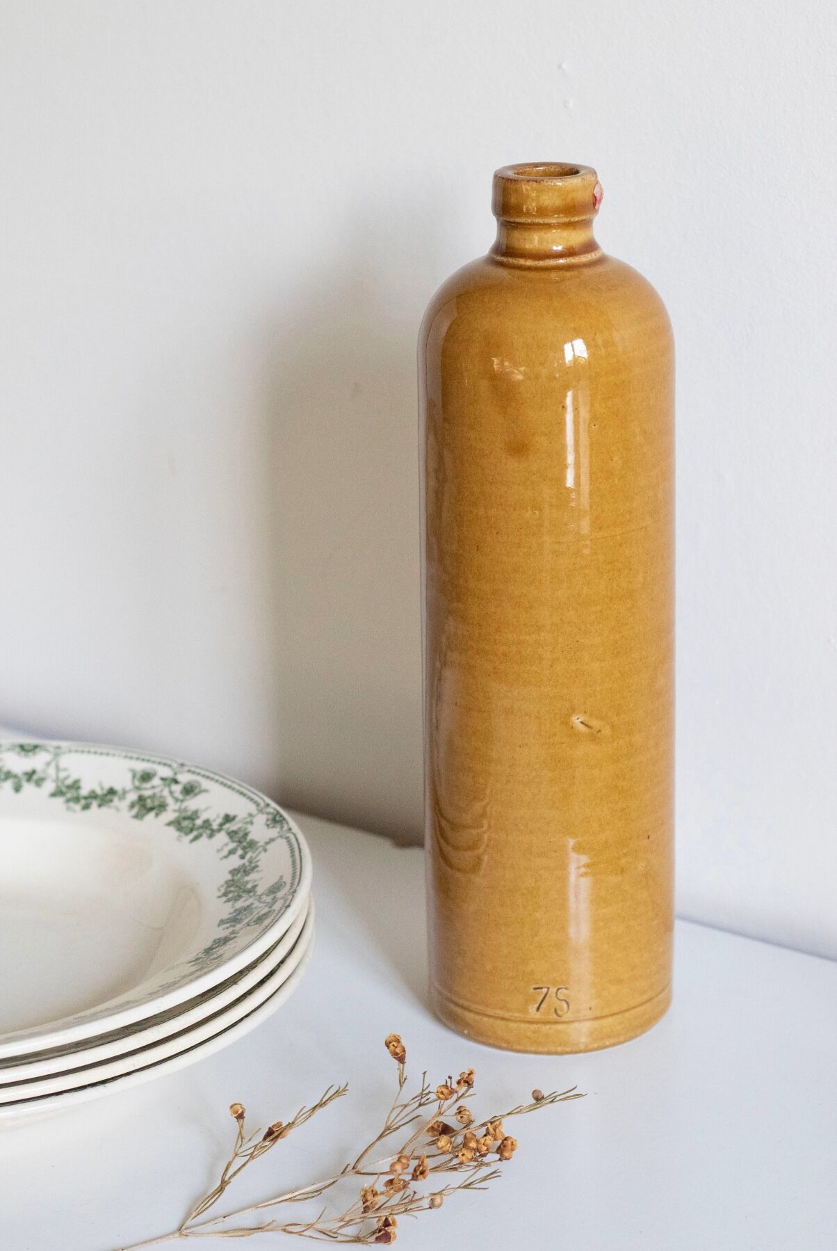Enamelled stoneware bottle