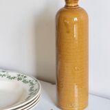 Enamelled stoneware bottle
