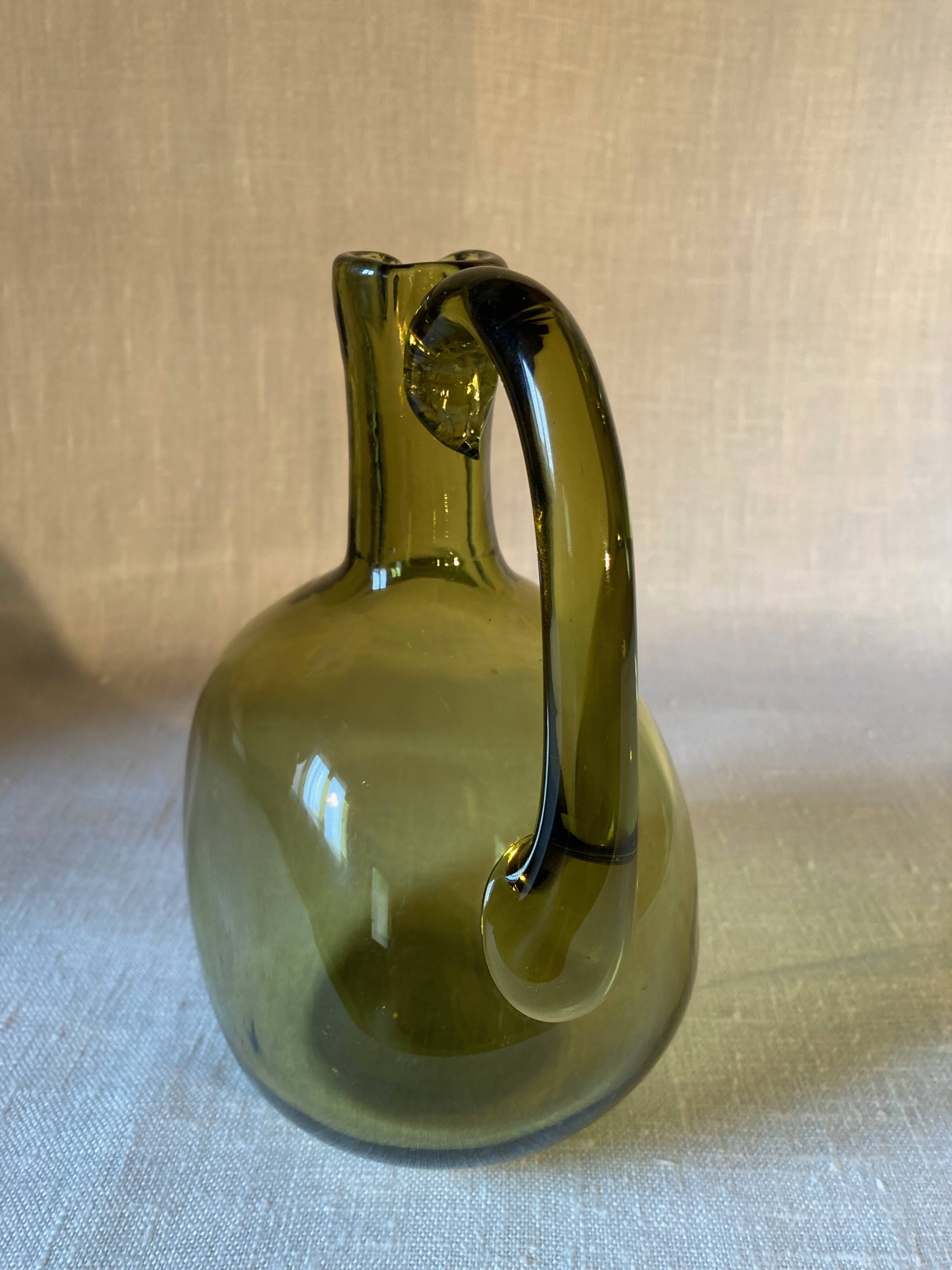 Green blown glass carafe