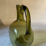Green blown glass carafe