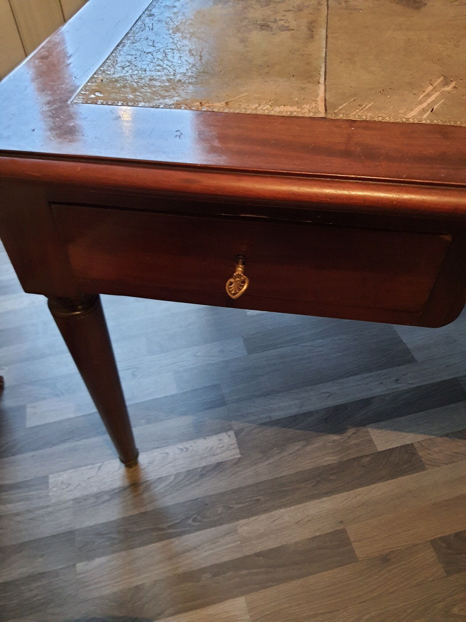 Mahogany desk on leather