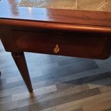 Mahogany desk on leather