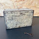 Old metal and wood medicine box with key