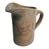 Handcrafted glazed stoneware pitcher decorated by hand