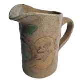Handcrafted glazed stoneware pitcher decorated by hand