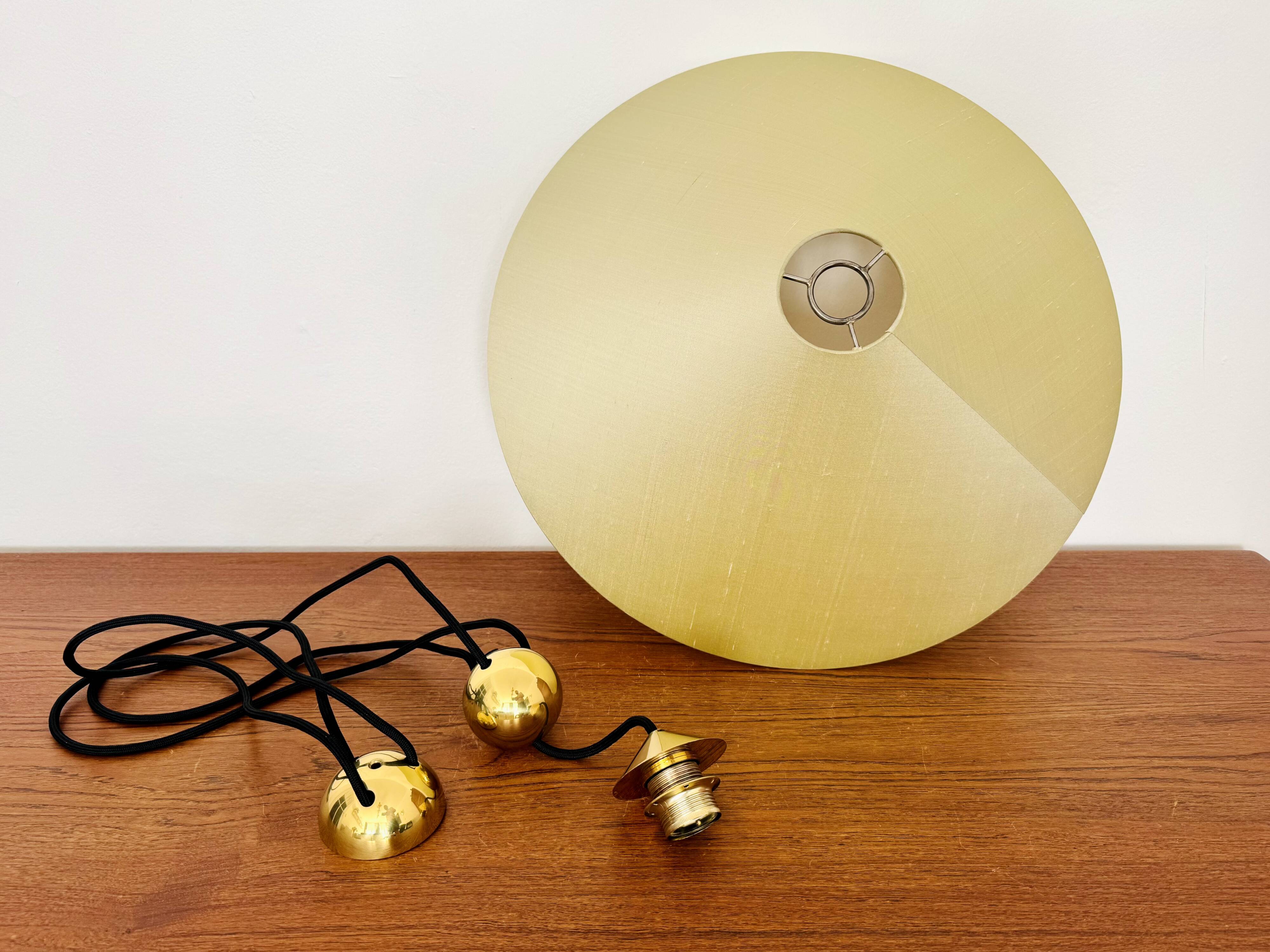 Adjustable Pendant Lamp with Counterweight by Florian Schulz