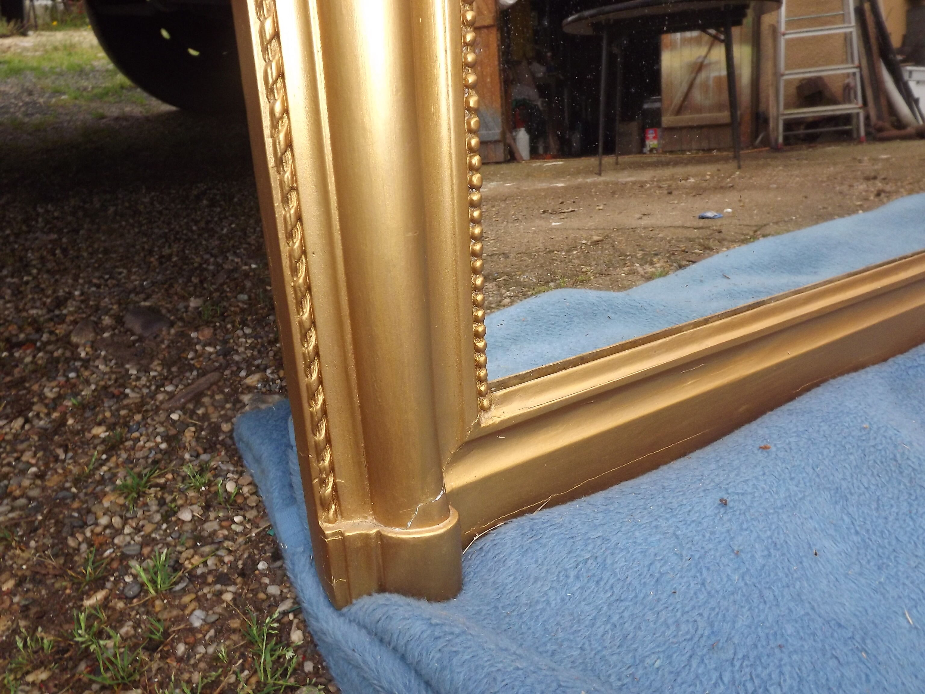 Golden mirror XlXth wood and stuk