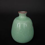 Vase en céramique craquelée XXe fond vert
