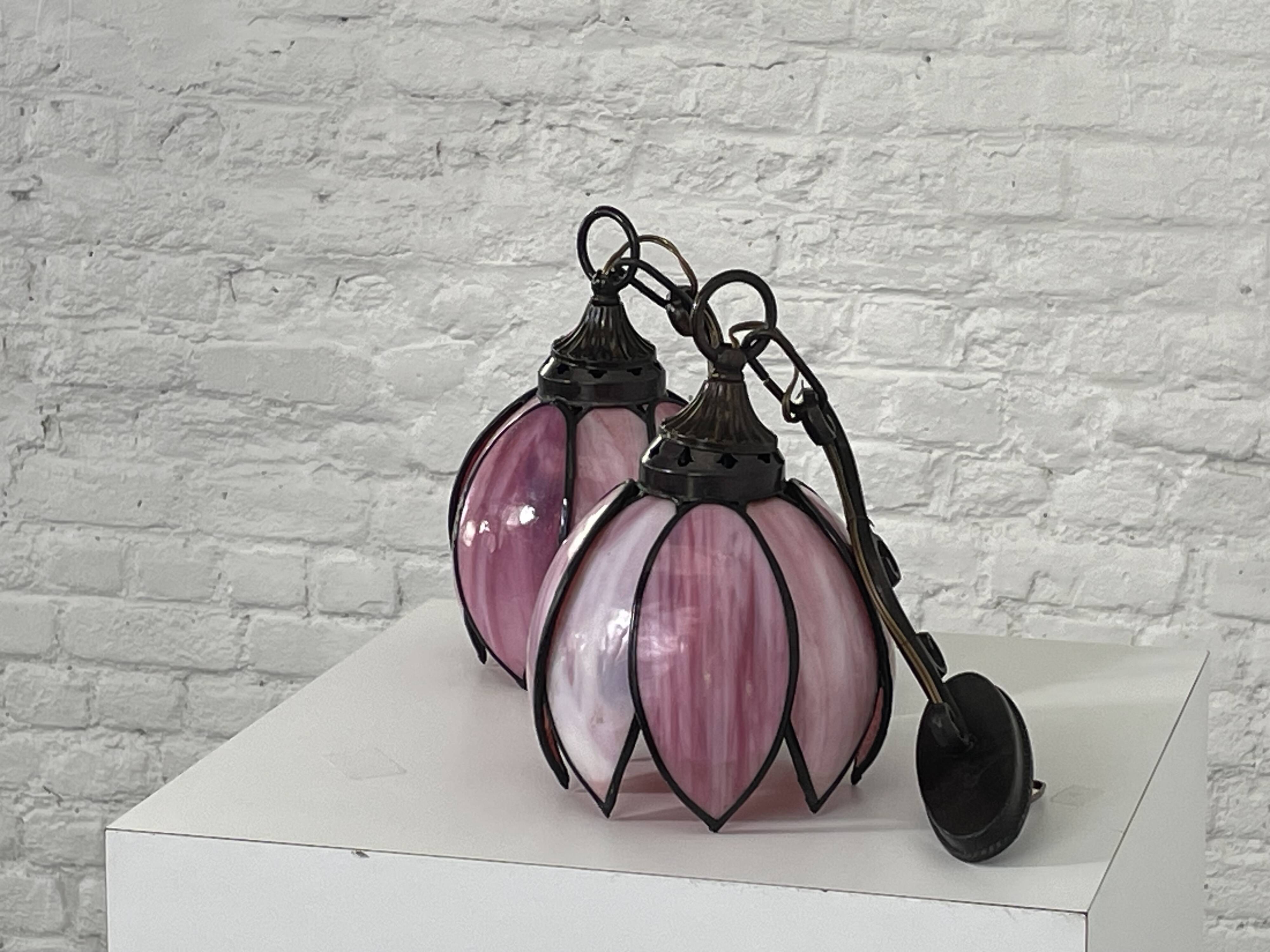 pair of iron wall lamps and Tiffany style glass legs