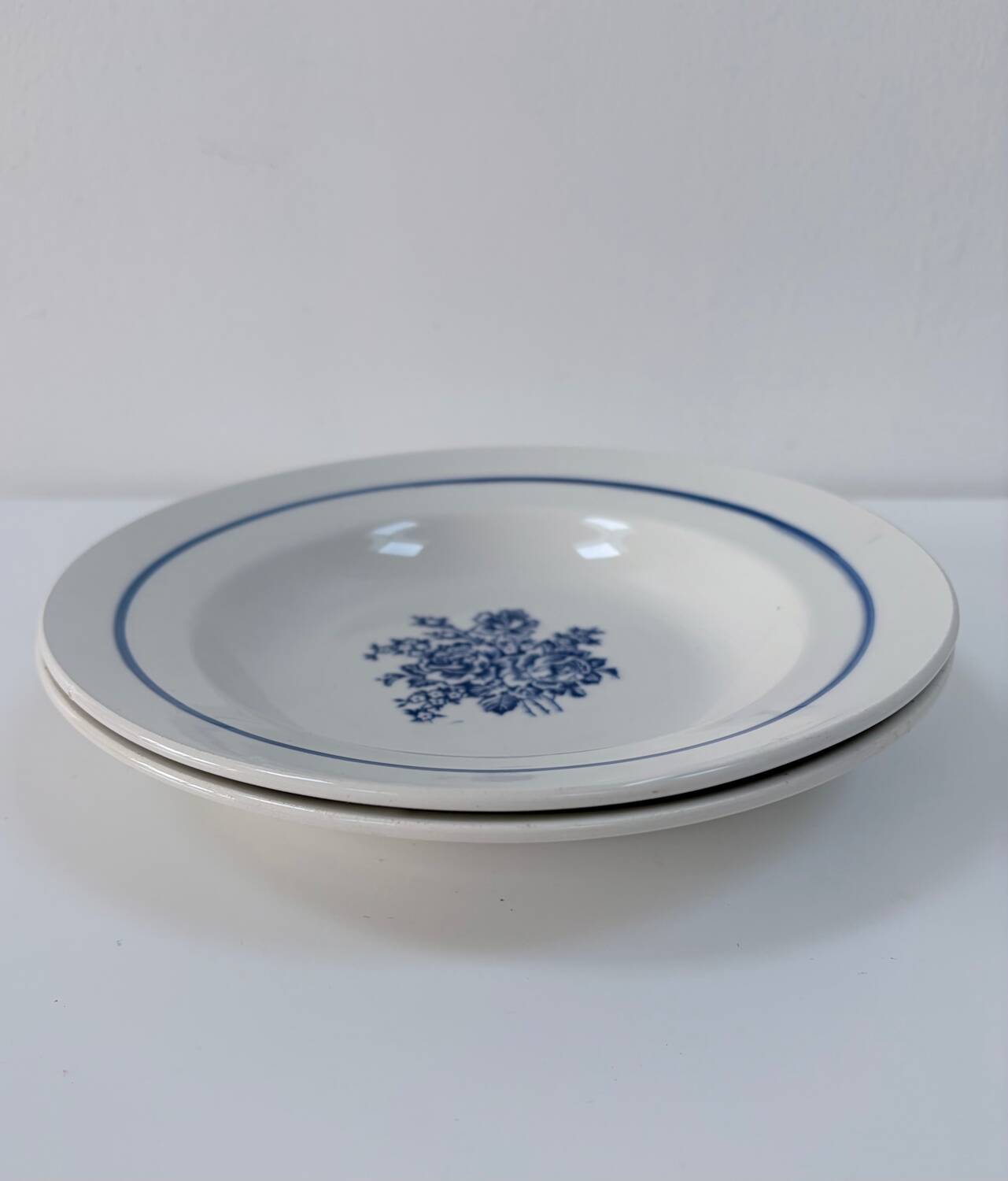 Pair of old hollow plates in earthenware