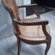 Fauteuil cabriolet canné de style Louis XV