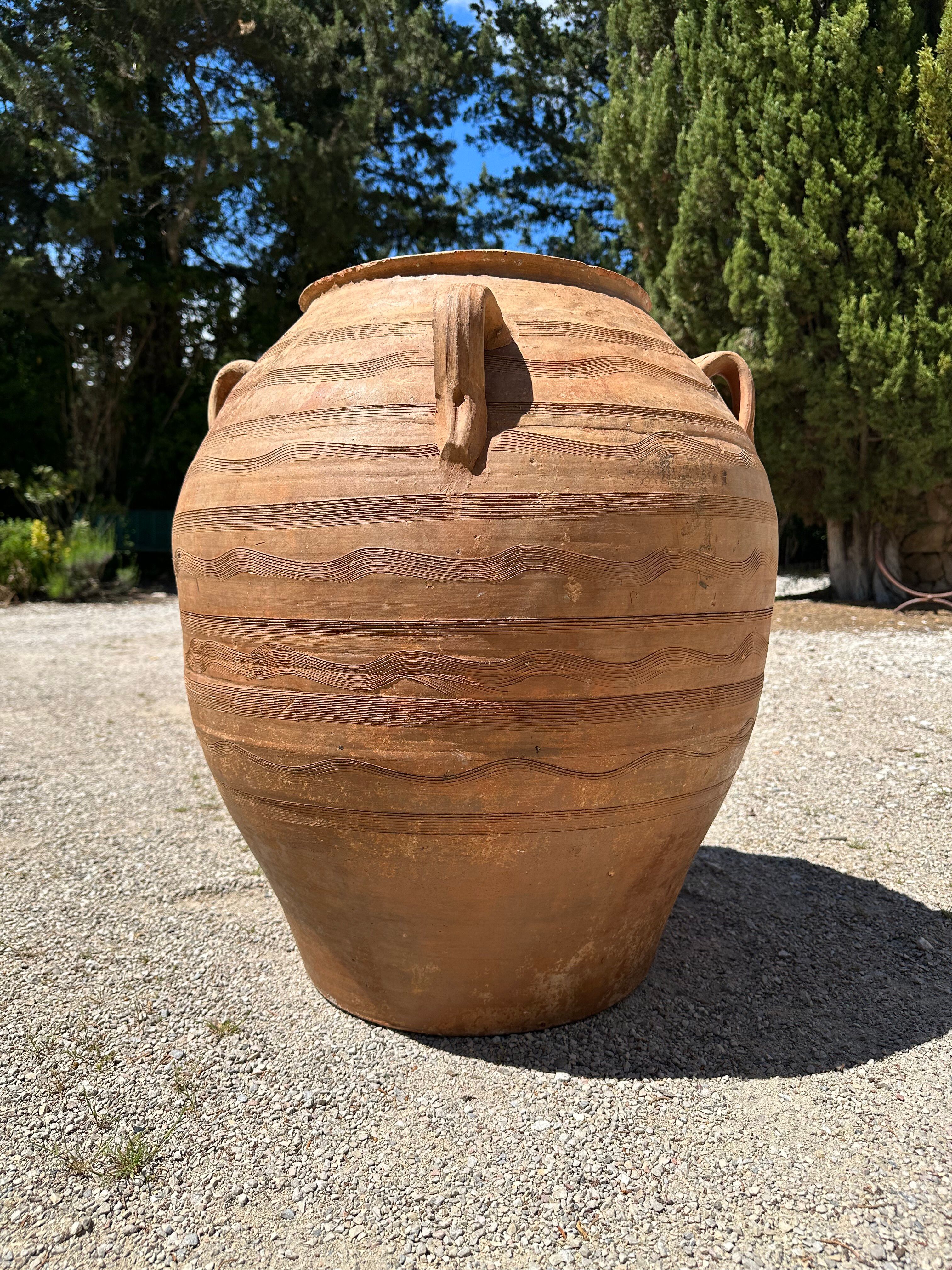 Ancient terracotta pottery jar from the 19th century.
