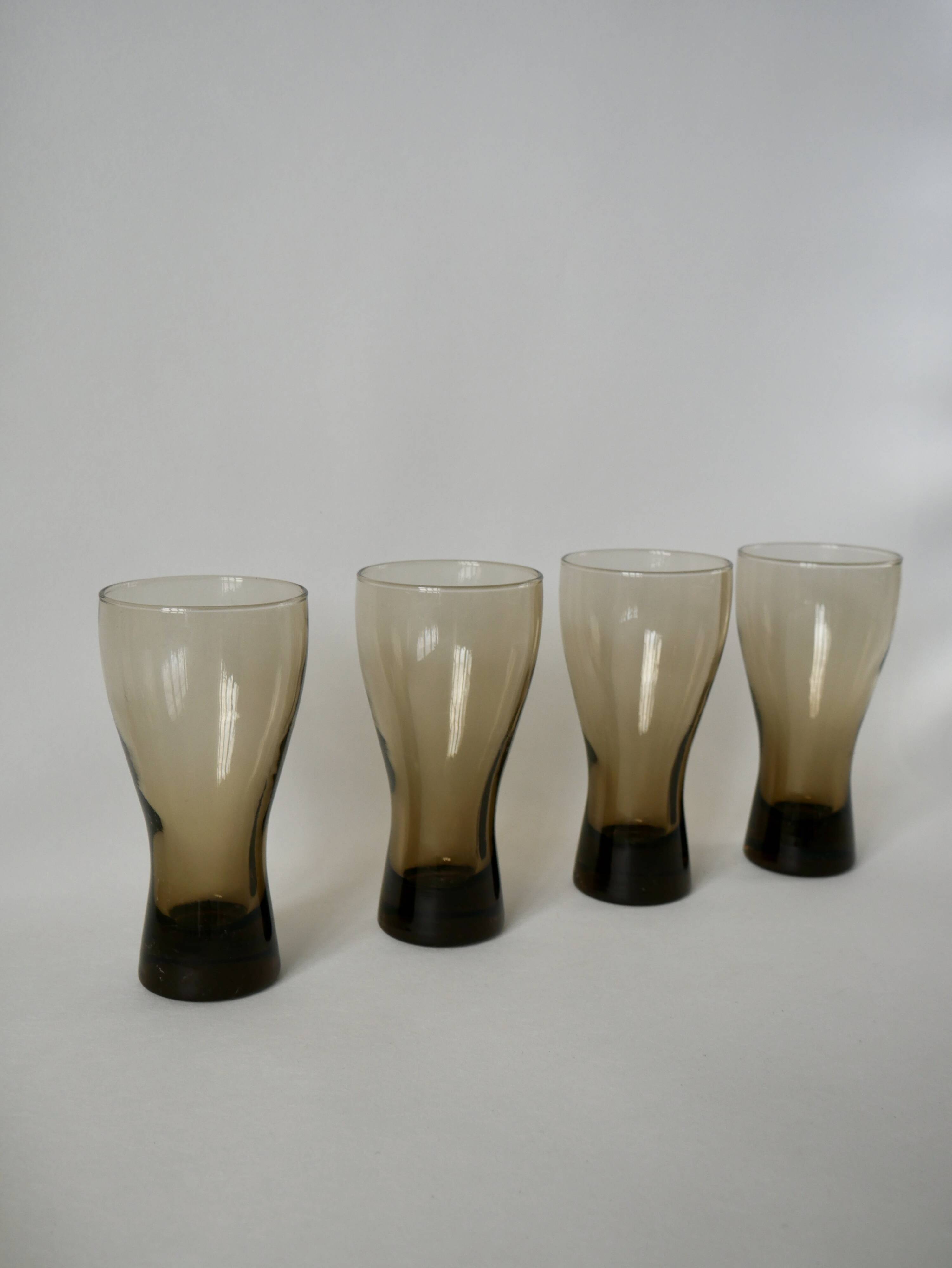 Set of 4 glasses in smoked glass and thick bottom from the 70s