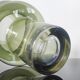 Sculptural vase in olive green glass