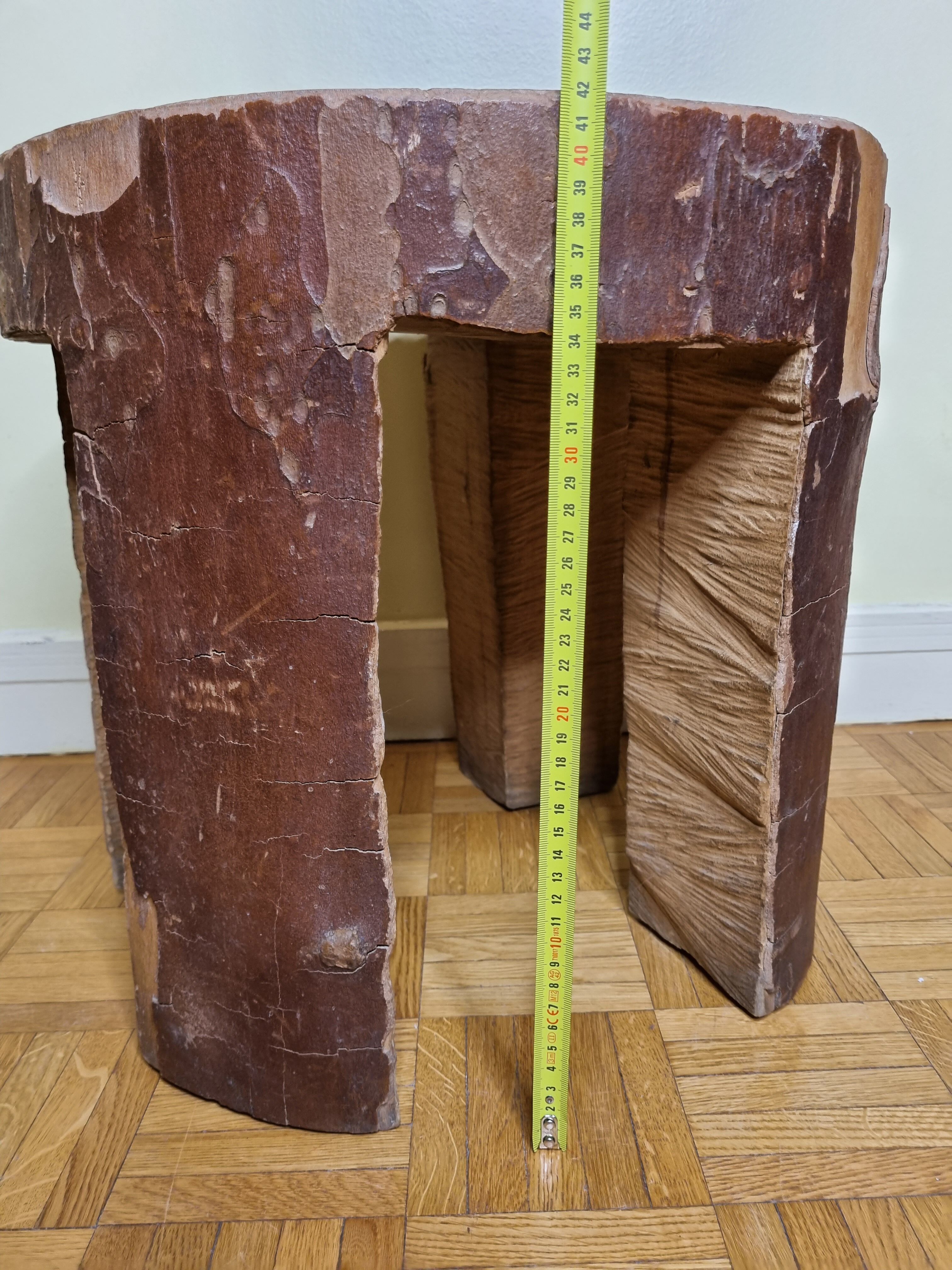 Brutalist solid wood coffee table carved from a room in a plane tree trunk