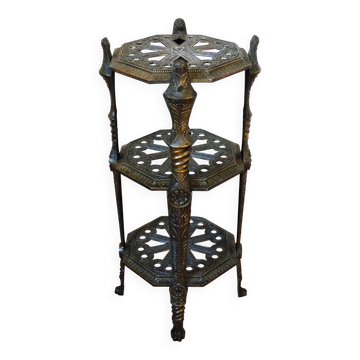 Italian side table with three openwork shelves in patinated metal.