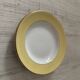 White and pastel yellow Amandinoise plates