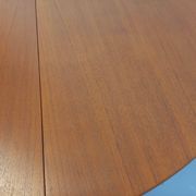 Round dining table in vintage Scandinavian style from the 50s and 60s in teak.