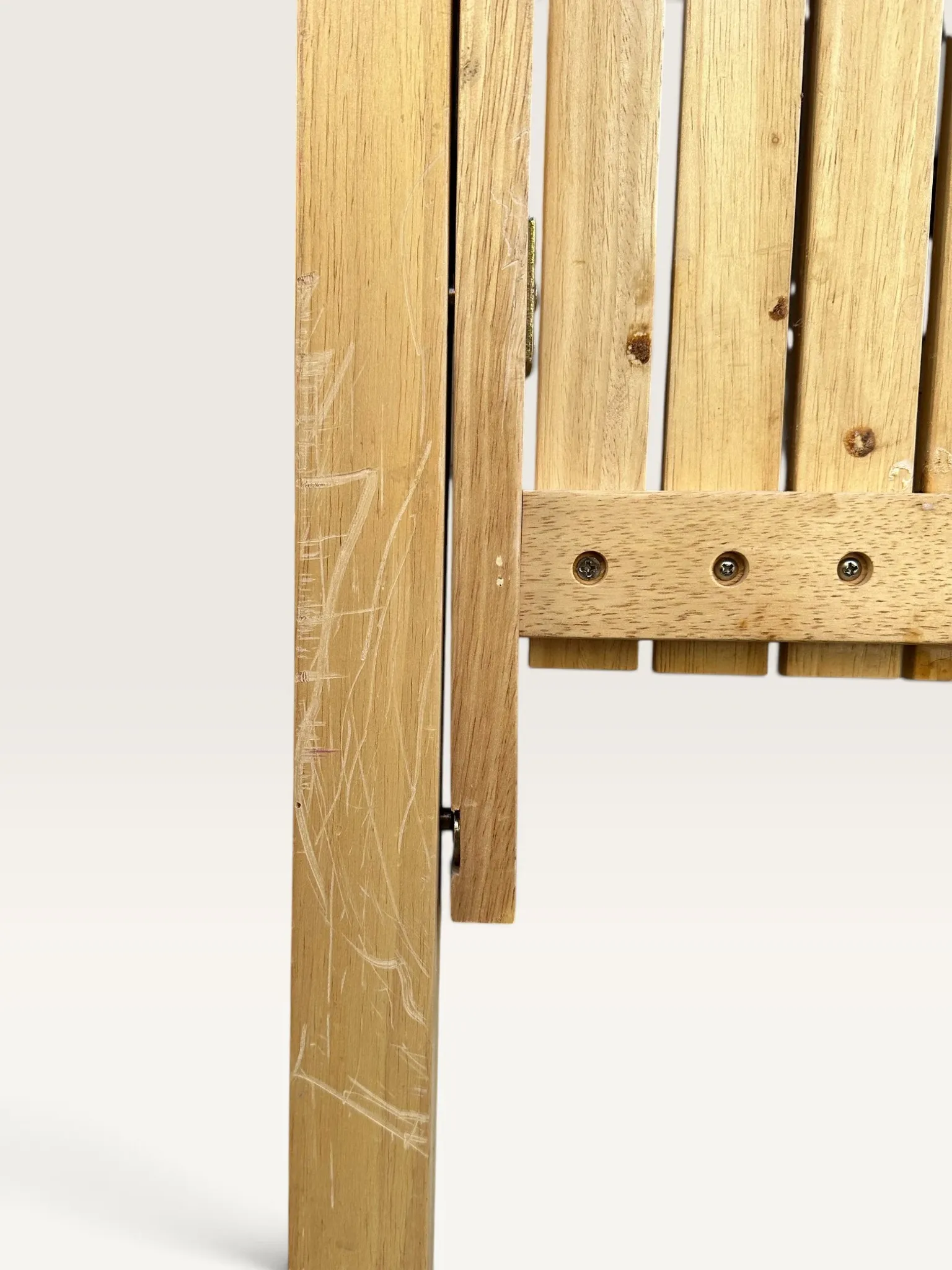 Blonde wooden folding chair in the style of Aldo Jacober.