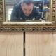Petit miroir d'entre deux en bois doré