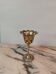 Lattice brass footed lantern with heart pattern