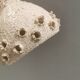 Ceramic hanging lamp in creamy white color that almost looks like a corral