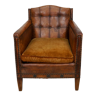 Fauteuil club en cuir cognac à dossier boutonné