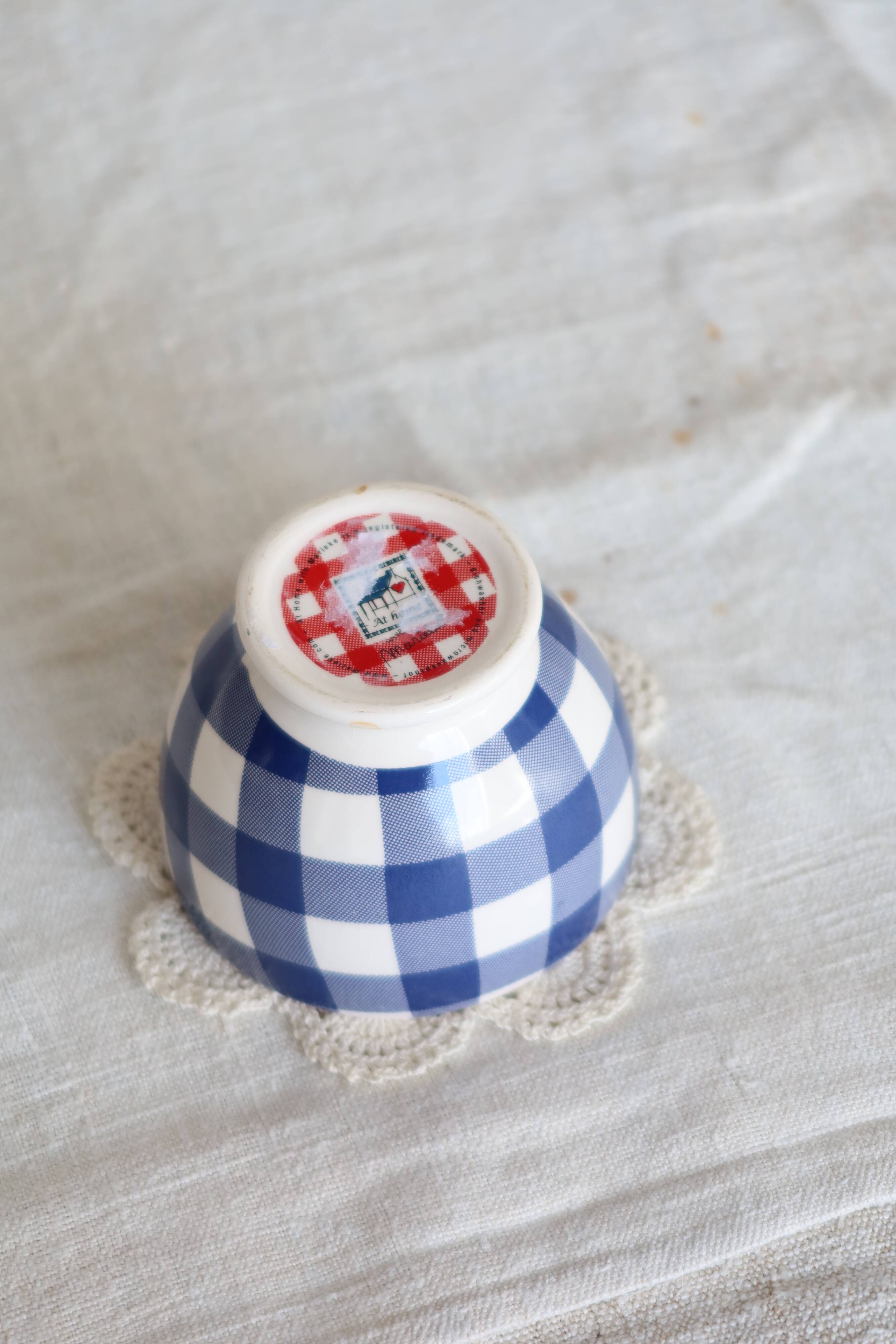 Small vintage white earthenware bowl with blue gingham pattern
