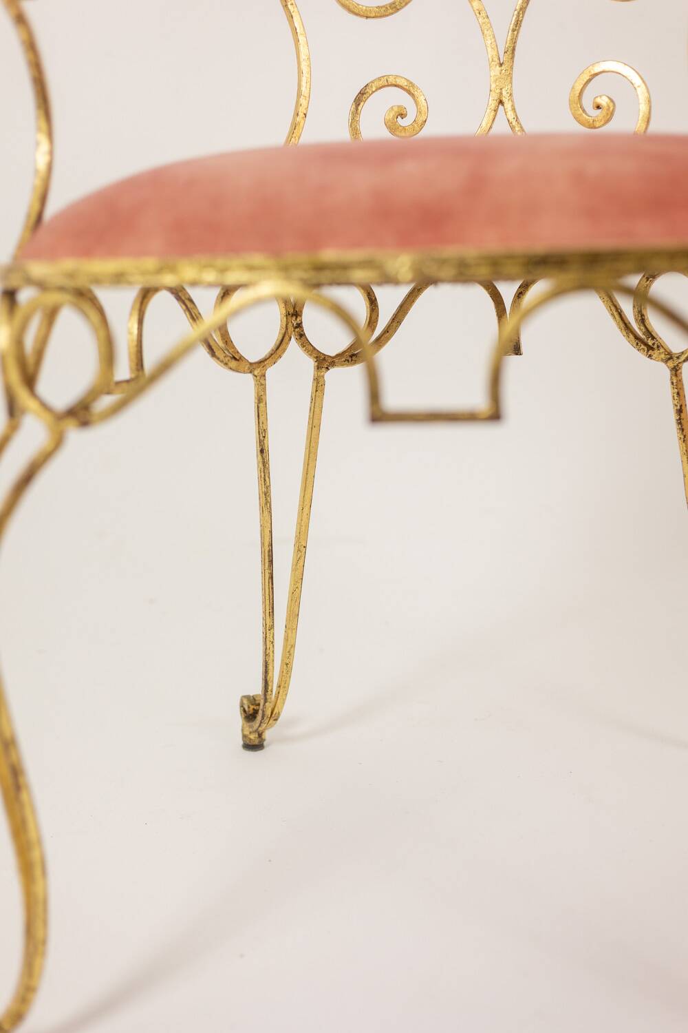 Pair of wrought iron and gilded armchairs, circa 1990