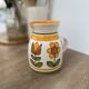 Small vintage ceramic jug signed – hand-painted floral decoration – 13 cm