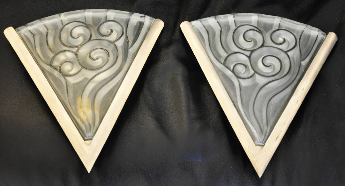 Pair of angular art deco wall sconces with silver metal frames