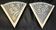 Pair of angular art deco wall sconces with silver metal frames