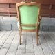 Antique French green upholstered armchair, carved wooden frame, style 1890-1919.
