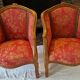 Pair of louis xv cabriolet armchairs with sculpted wood and pink & red floral fabric