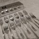 12 silver-plated metal cake forks by Ercuis Horizon silversmiths, 14.9cm