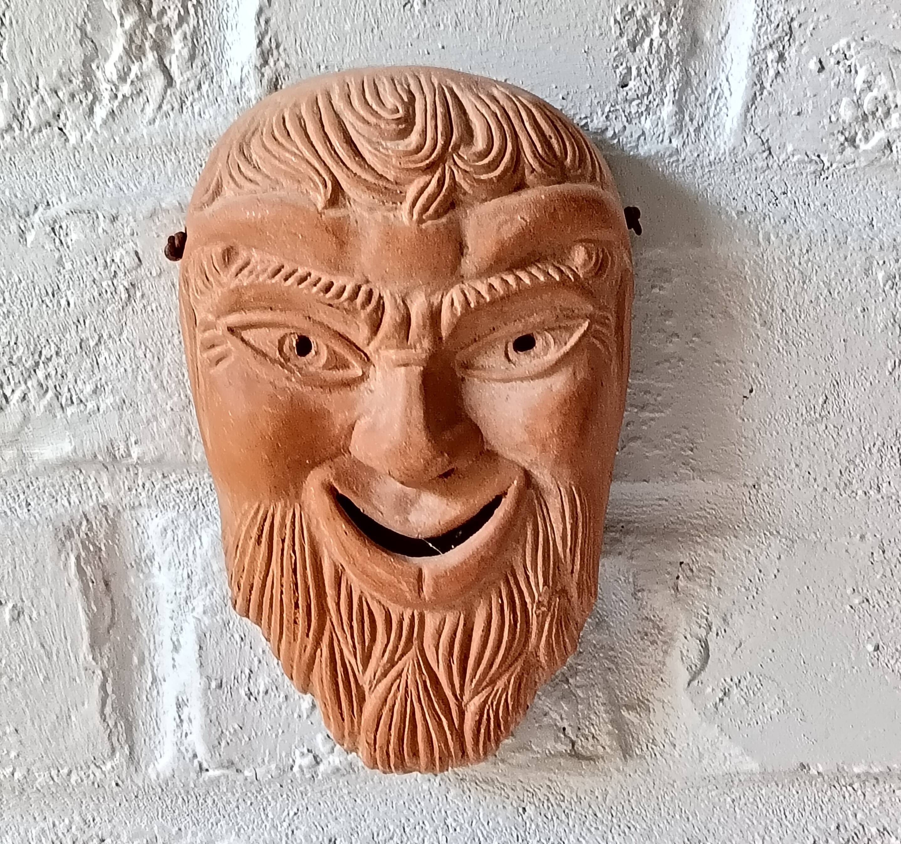 2 vintage terracotta masks made in Greece