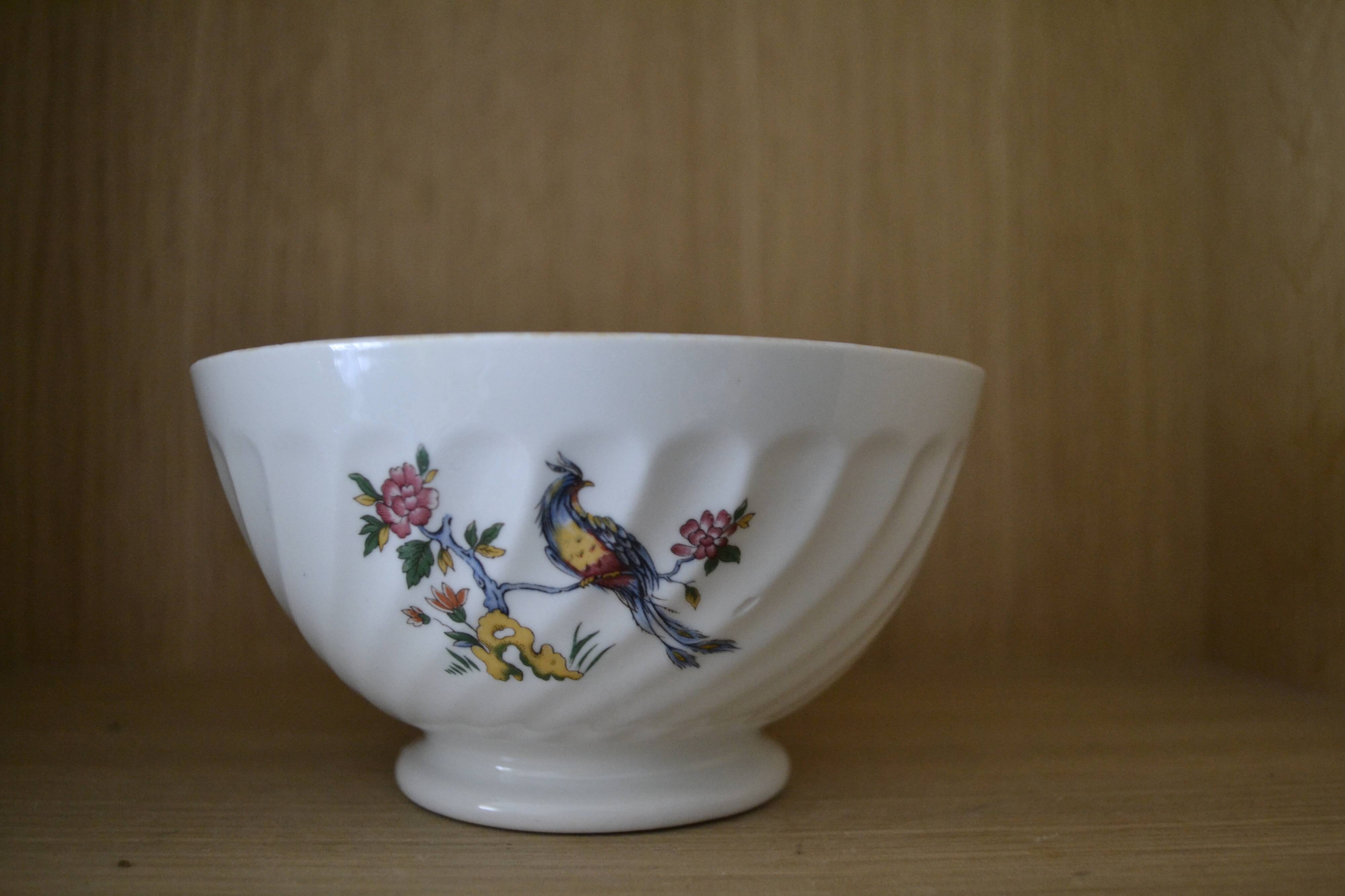 White porcelain bowl peacock pattern and flowers