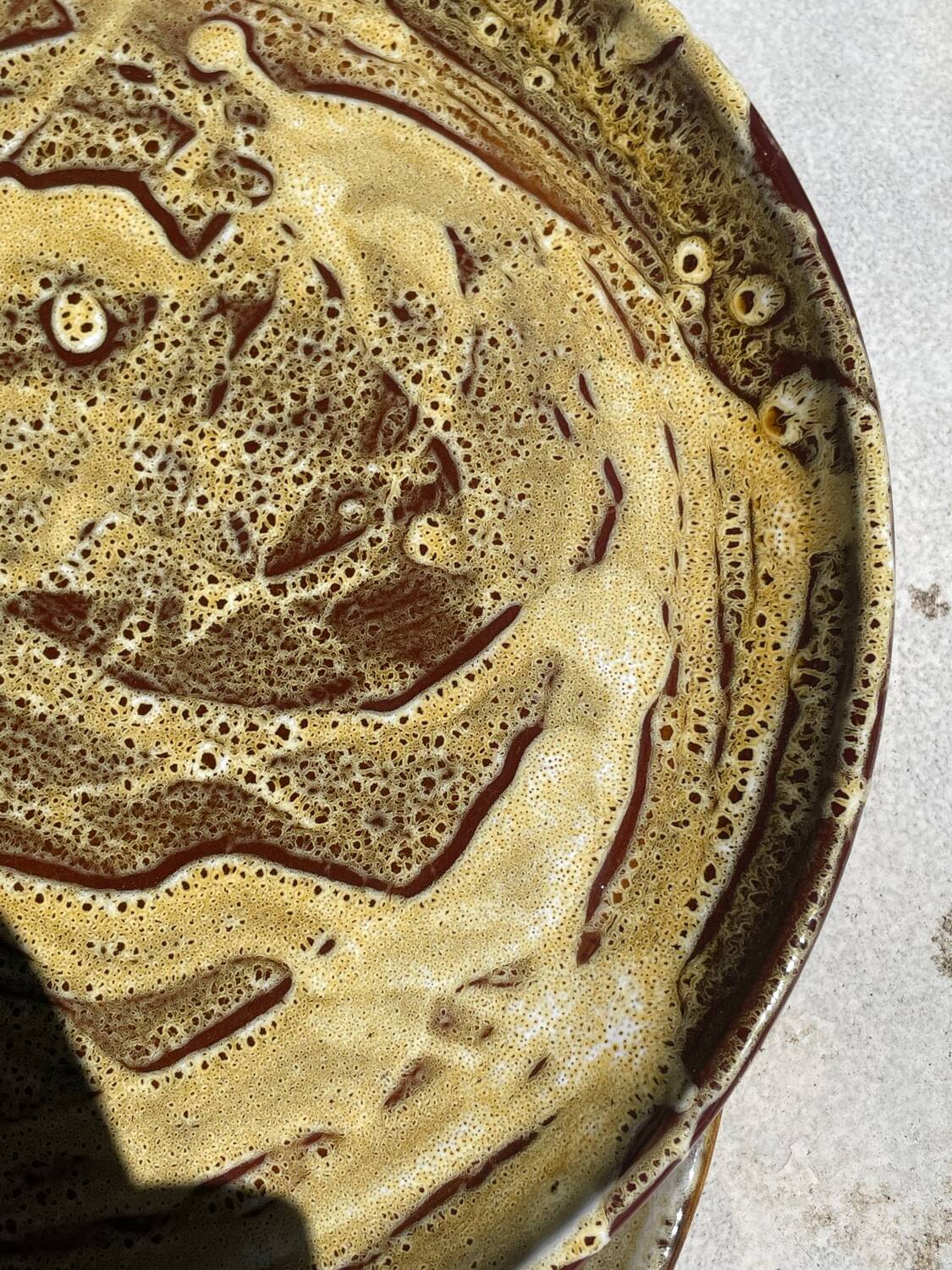 Pair of green glazed stoneware ceramic plates