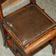Victorian library chair, convertible, hardwood, leather, brass, circa 1880.