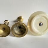 Trio of brass and vintage onyx candlesticks