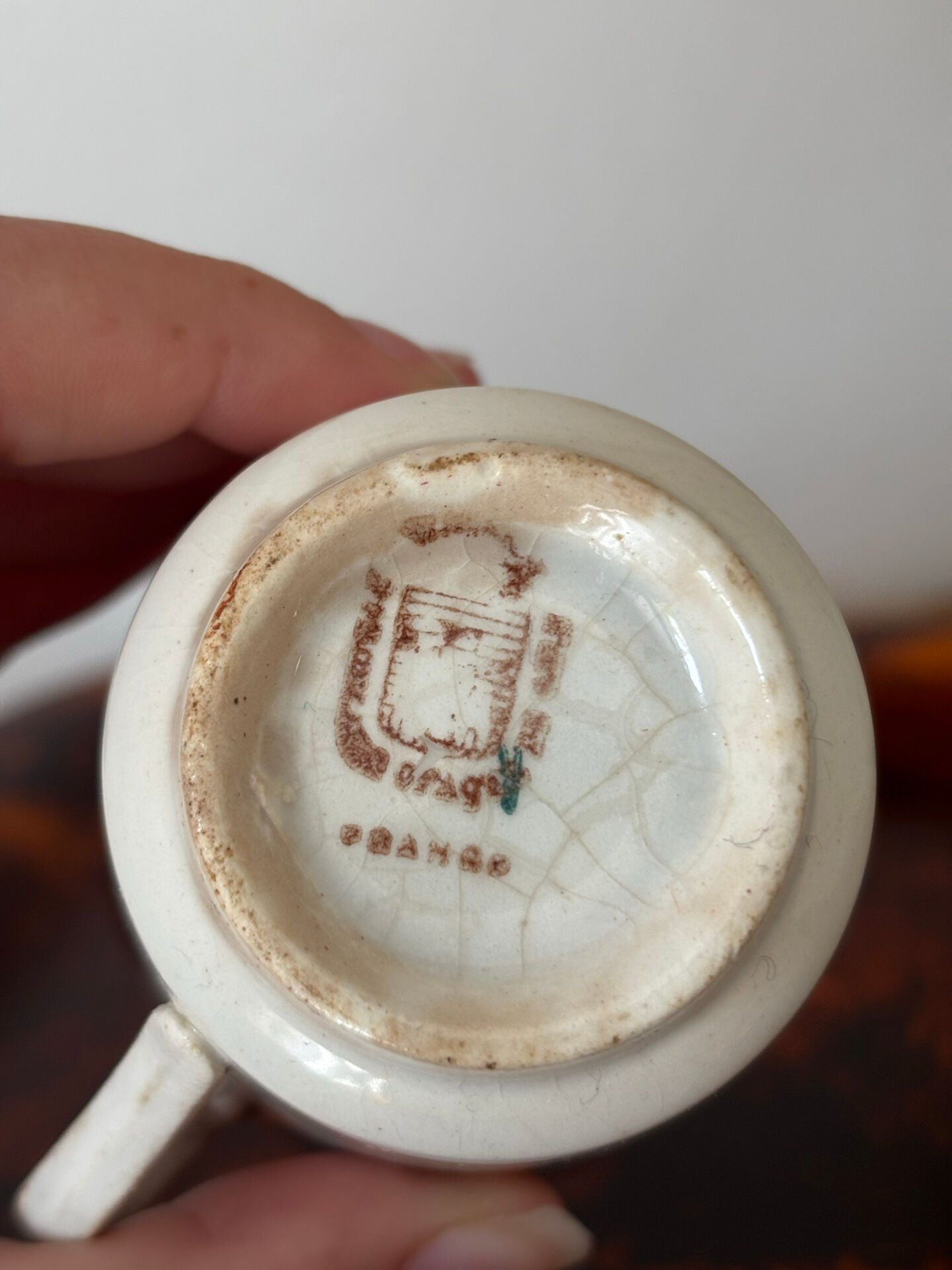 Set of two antique opaque porcelain cups from Gien.