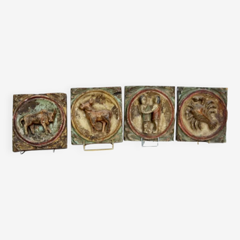 Set of four bas reliefs