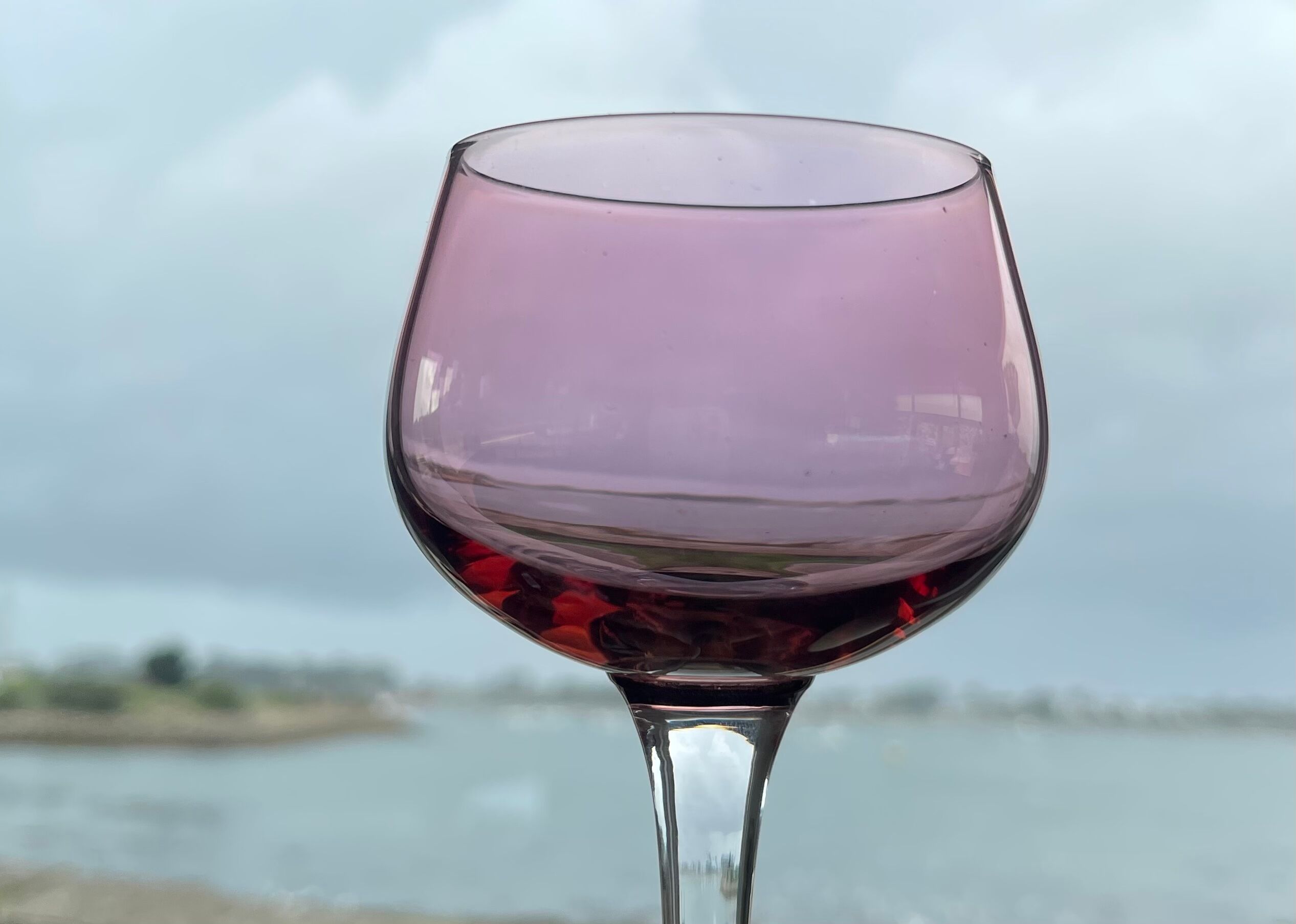 7 vintage iridescent foot glasses