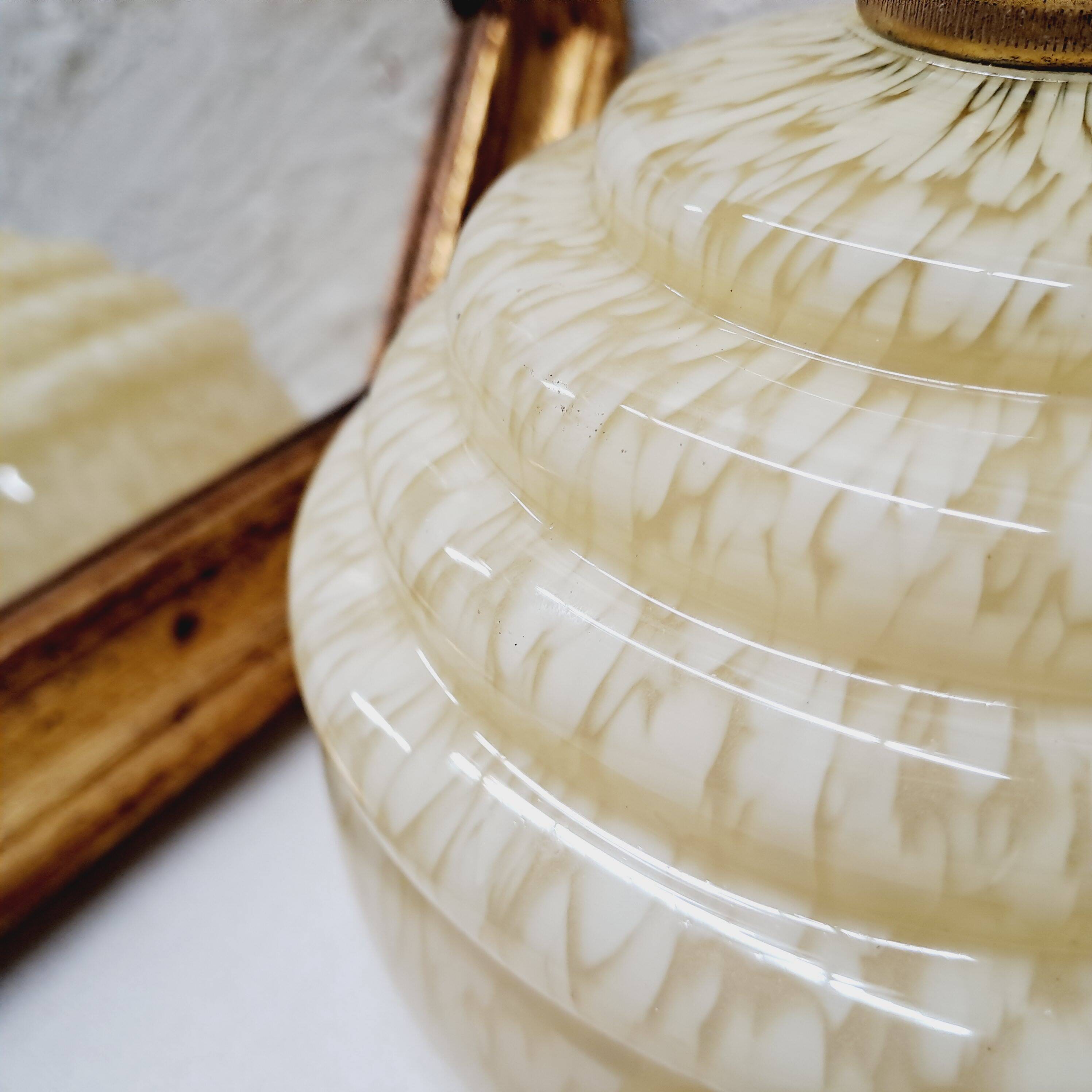 Pale yellow clichy glass globe