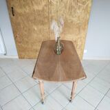 Round walnut shutter table